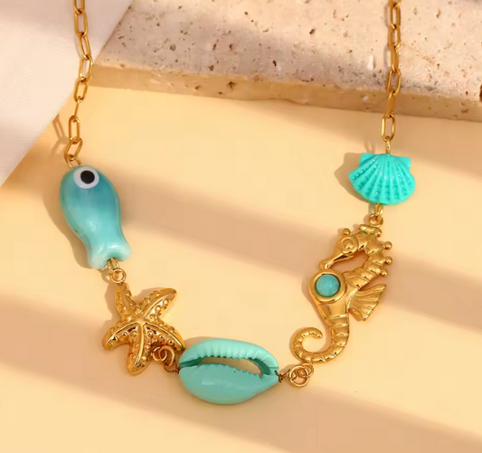Kaia gold pendant necklace worn on neck — Alphenik UAE