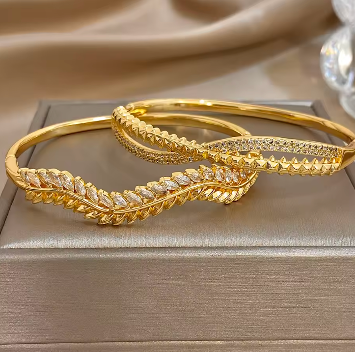 Elise gold rhinestone bangle detail — Alphenik UAE
