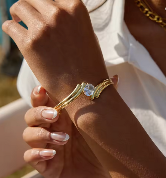 Nova 18K gold plated zircon bangle worn on wrist — Alphenik UAE