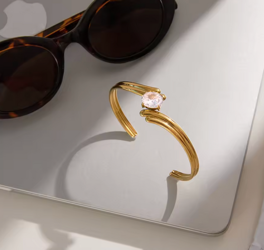 Nova gold bangle close-up — Alphenik UAE