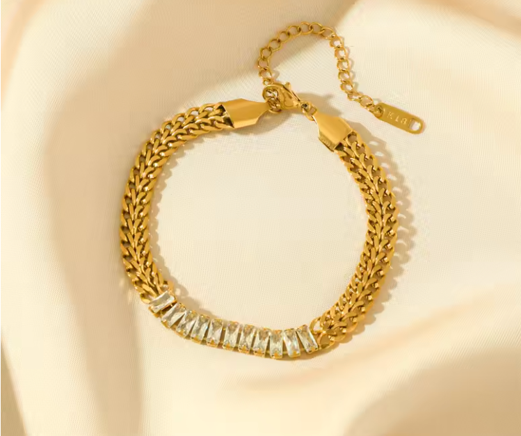 Tara gold curb chain bracelet with baguette zircon — Alphenik UAE